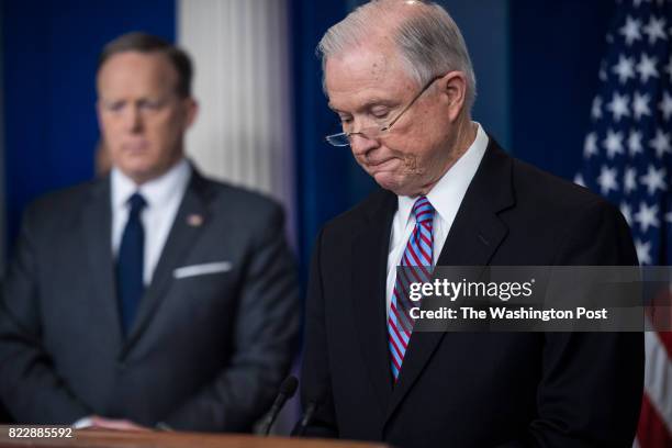 Attorney General Jeff Sessions, right, accompanied by White House press secretary Sean Spicer, talks to reporters and members of the media during the...