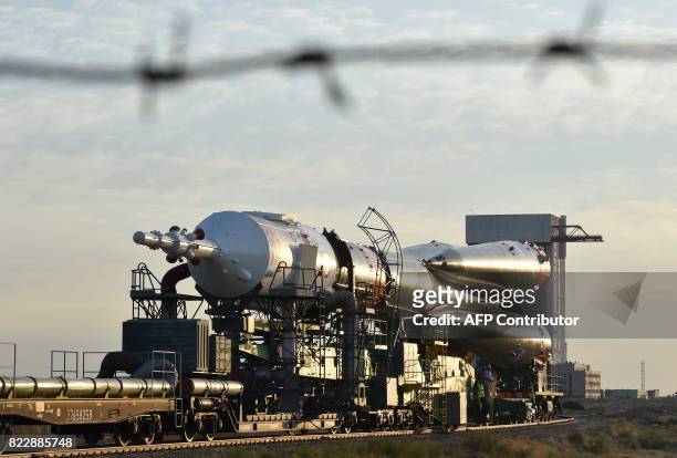 Russian Soyuz MS-05 spacecraft is transported by train to the launch pad at Baikonur cosmodrome in Kazakhstan on July 26, 2017. The launch of the...