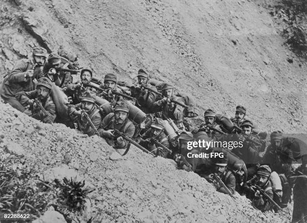 Italian soldiers in a trench on the Carso Plateau during World War I, circa 1916.