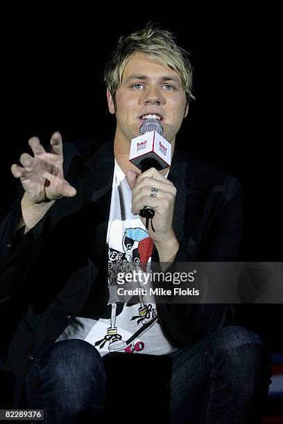 Singer Brian McFadden performs the MC duties during the third annual Dolly Teen Choice Awards at Luna Park on August 13, 2008 in Sydney, Australia.