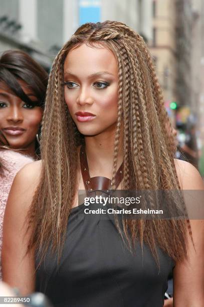 Host Tyra Banks attends "The Tyra Banks Show" celebration of the first all black model issue of Vogue Italia on August 12, 2008 in New York City.