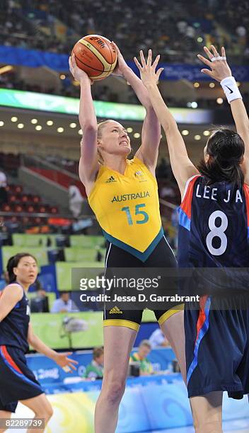 Lauren Jackson of Australia shoots against Jong Ae Lee of Korea during day 3 of women's preliminary basketball at the 2008 Beijing Olympic Games at...