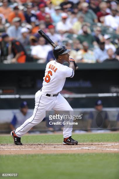 Melvin Mora of the Baltimore Orioles hits a home run against the Texas Rangers on August 10, 2008 at Camden Yards in Baltimore, Maryland.