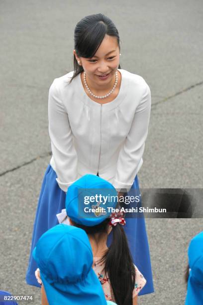 Princess Kako of Akishino talks with kindergarten children on arrival at the 51st All Japan High School Equestrian Championships at the Gotemba City...