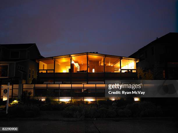 house at night with for sale sign - seattle house stock pictures, royalty-free photos & images
