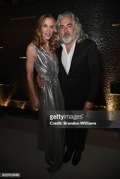Actor Kelly Lynch and producer Mitch Glazer attend the party for the screening of "Mr. Mercedes" during the AT&T AUDIENCE Network Summer TCA Panels...