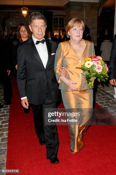 German chancellor Angela Merkel and her husband Joachim Sauer during the Bayreuth Festival 2017 State Reception on July 25, 2017 in Bayreuth, Germany.