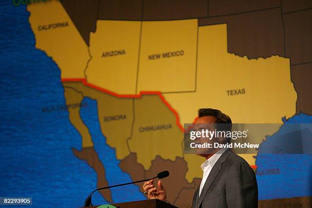 California Gov. Arnold Schwarzenegger gives his opening speech near a map of the US-Mexico border at the 26th Borders Governors Conference, which...