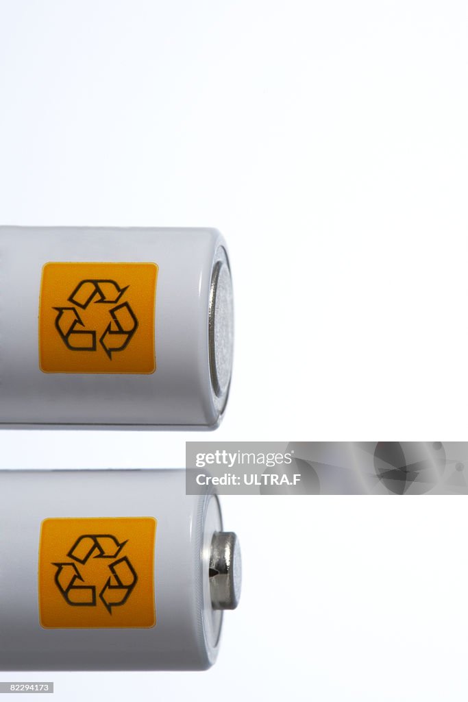 Recycle signs on battery