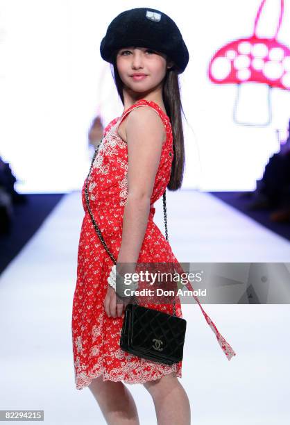 Child model showcases designs by Little Leona on the catwalk part of the inaugural Rosemount Sydney Fashion Festival 2008 at Martin Place on August...