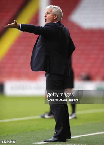 Mark Hughes, the Stoke City manager shouts instructions during the pre season friendly match between Sheffield United and Stoke City at Bramall Lane...