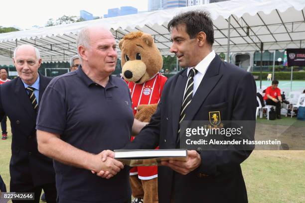 Uli Hoeness, President of FC Bayern Muenchen attends with Sher Baljit Singh Johal, President of the Singapore Cricket Club the FC Bayern...