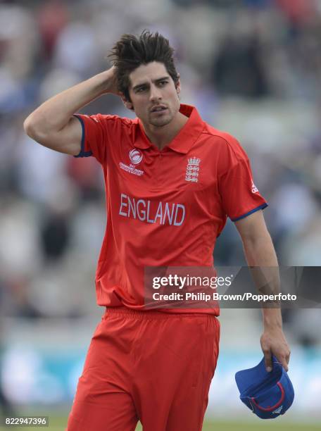 England captain Alastair Cook leaves the field after his team won the ICC Champions Trophy group match between England and Australia by 48 runs at...