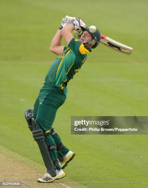David Miller of South Africa attempts to hit the ball during the ICC Champions Trophy group match between South Africa and West Indies at the Swalec...