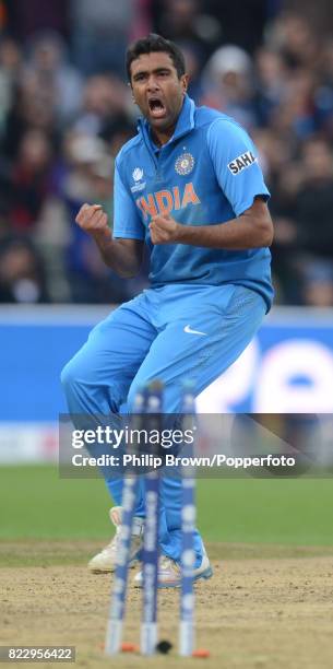 Ravichandran Ashwin of India celebrates the dismissal of England batsman Jonathan Trott during the reduced-overs ICC Champions Trophy Final between...