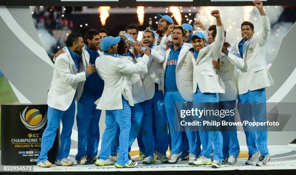 India celebrate with the trophy after they won the ICC Champions Trophy Final between England and India at Edgbaston, Birmingham, 23rd June 2013....