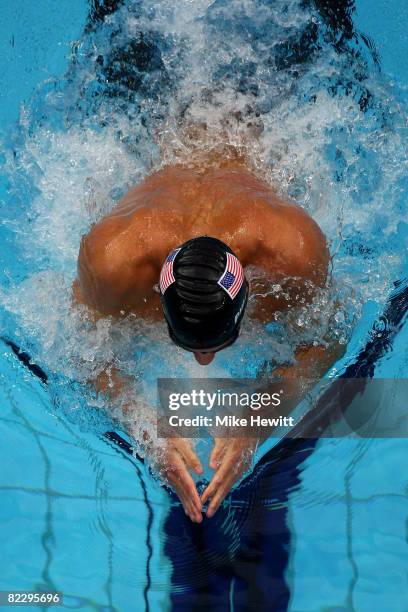 Michael Phelps of the United States competes in the Men's 200m Individual Medley Semifinal 1 held at the National Aquatics Centre during Day 6 of the...