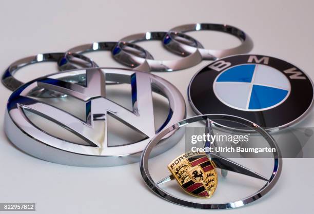 Under observation of the cartel authorities - the photo shows the logos of the car manufacturers AUDI, Volkswagen, BMW, Mercedes Benz and Porsche.