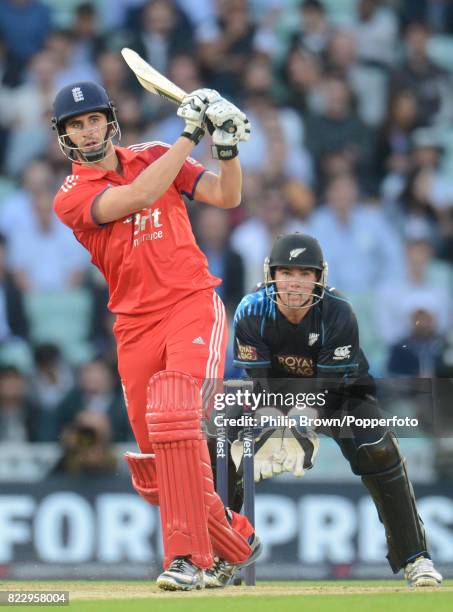 England batsman Alex Hales hits out during his innings of 39 runs watched by New Zealand wicketkeeper Tom Latham during the 1st NatWest International...
