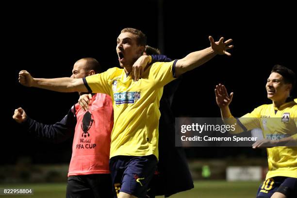 Bradley Robertson of Hills Brumbies celebrates scoring a goal with team mates during the FFA Cup round of 32 match between Hills United FC and Hakoah...