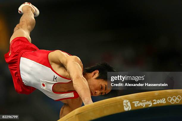 Hiroyuki Tomita of Japan competes on the vault during the men's individual all-around final in the artistic gymnastics event at the National Indoor...