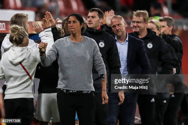 Head Coach Steffi Jones of Germany celebrates second goal with the German team during the Group B match between Russia and Germany during the UEFA...