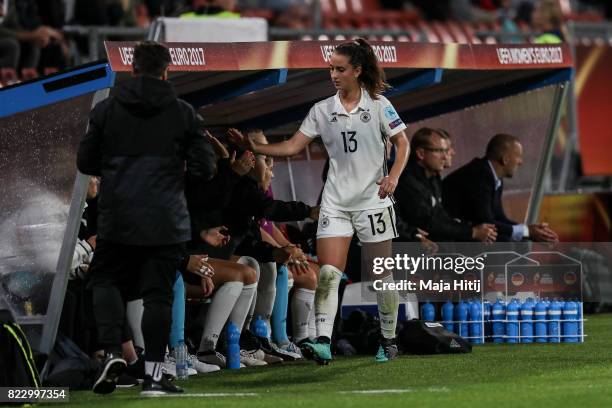 Sara Daebritz of Germany celebrates with the team after she leaves the pitch during the Group B match between Russia and Germany during the UEFA...