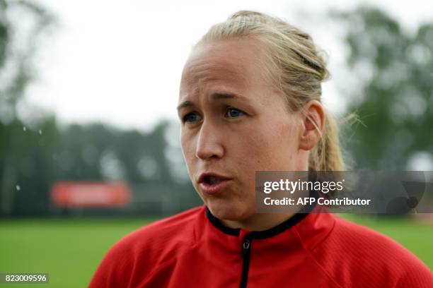 Denmark's women national football team goalkeeper Stina Lykke Petersen speaks during an interview following a training session with her team as part...