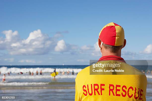life guard on manly beach, sydney, australia - badmeester stockfoto's en -beelden