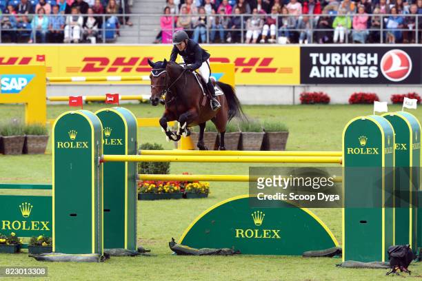 Meredith MICHAELS-BEERBAUM riding DAISY during the Rolex Grand Prix, part of the Rolex Grand Slam of Show Jumping of the World Equestrian Festival,...