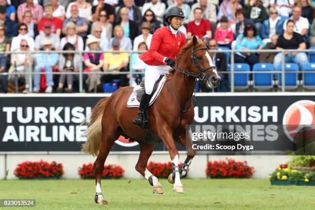 Elizabeth MADDEN riding DARRY LOU during the Rolex Grand Prix, part of the Rolex Grand Slam of Show Jumping of the World Equestrian Festival, on July...