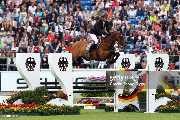 Marc HOUTZAGER riding STERREHOF'S CALIMERO during the Rolex Grand Prix, part of the Rolex Grand Slam of Show Jumping of the World Equestrian...
