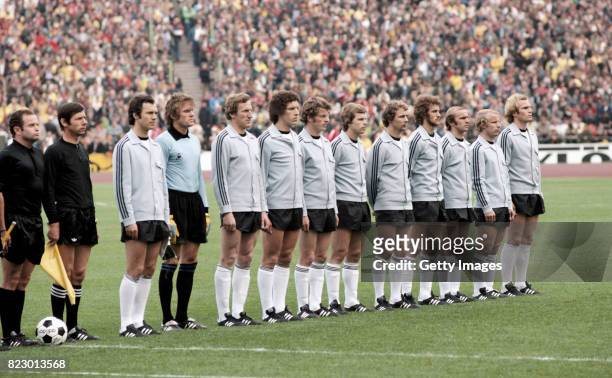 The West Germany team line up in their Adidas tracksuit top's before a match in the 1976 European Championships at the Olympic Stadium in Munich,...