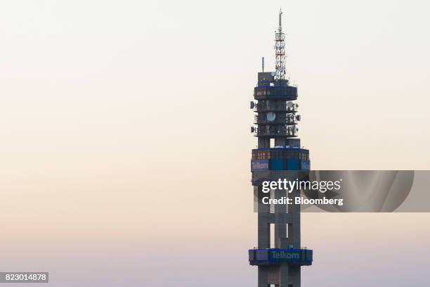 Communications dishes and devices sit on the Telkom Tower, operated by Telkom SA SOC Ltd., in Pretoria, South Africa, on Tuesday, July 25, 2017....