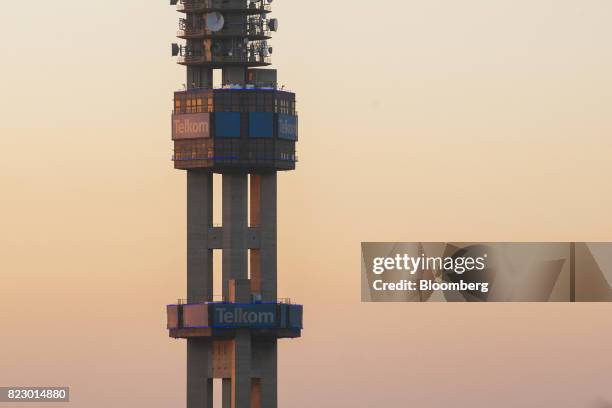 Communications dishes and devices sit on the Telkom Tower, operated by Telkom SA SOC Ltd., in Pretoria, South Africa, on Tuesday, July 25, 2017....
