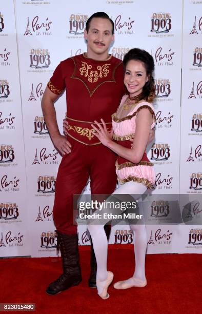 Cast members Andrei Kalesnikau and Anny Laplante of Les Incredibles arrive at the opening night of "CIRCUS 1903" at Paris Las Vegas on July 25, 2017...