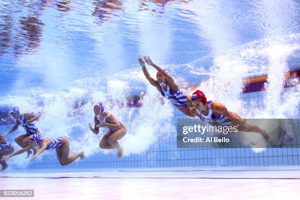 Italy dives in to play Australia during the Women's Water Polo Classification 5th-8th Place on day thirteen of the Budapest 2017 FINA World...