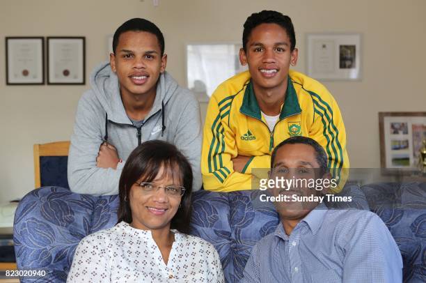 South African high jumper Breyton Poole is seen with his brother Hagan, his parents, Charmaine and Herman Poole during an interview at his home on...
