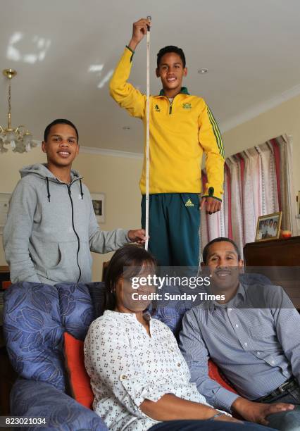 South African high jumper Breyton Poole is seen with his brother Hagan, his parents, Charmaine and Herman Poole during an interview at his home on...