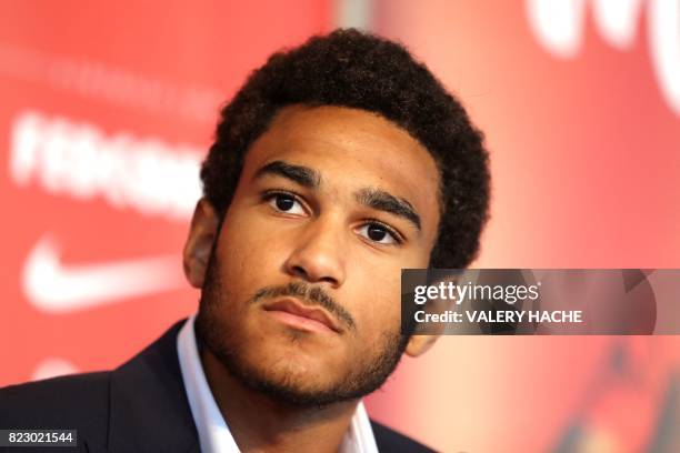 Monaco's Spain forward Jordi Mboula looks on during a press conference for the official presentation of new players for French L1 football club of...