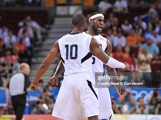 LeBron James and Kobe Bryant of the U.S. Men's Senior National Team celebrate against Greece during a men's preliminary basketball game at the 2008...