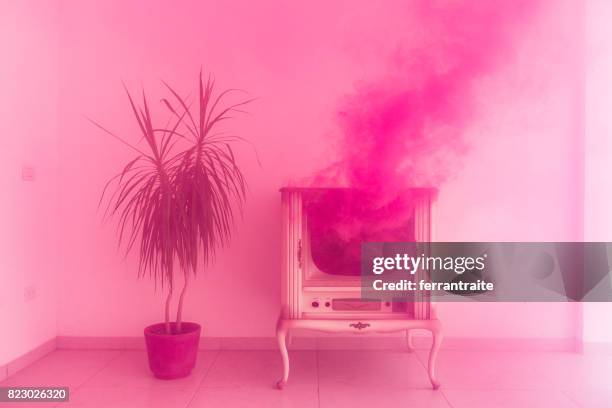 millennial pink - television set smoke stock pictures, royalty-free photos & images