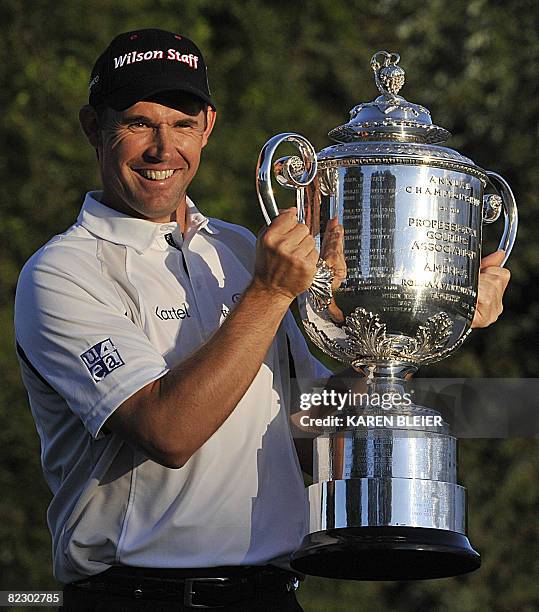 Padraig Harrington of Ireland holds the Wanamaker Trophy after winning the 90th PGA Championship August 10, 2008 at the Oakland Hills Country Club in...