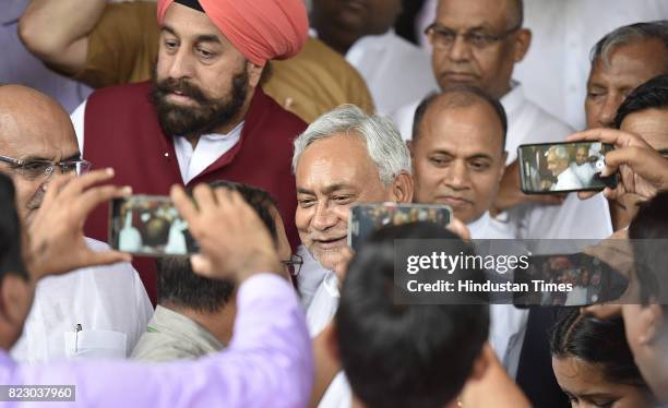 Bihar Chief Minister Nitish Kumar leaving after swearing in ceremony of the new president Ram Nath Kovind at Parliament House on July 25, 2017 in New...