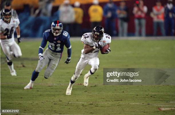 Super Bowl XXXV: Baltimore Duane Starks in action, returning interception for touchdown vs New York Giants at Raymond James Stadium. Tampa, FL...