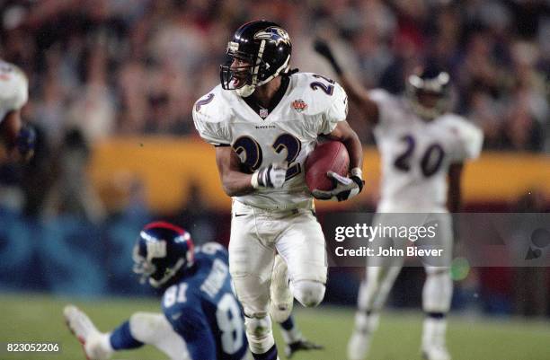 Super Bowl XXXV: Baltimore Duane Starks in action, returning interception for touchdown vs New York Giants at Raymond James Stadium. Tampa, FL...