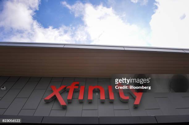 Signage is displayed on the exterior of a Comcast Corp. Xfinity store in King Of Prussia, Pennsylvania, U.S., on Tuesday, July 25, 2017. Comcast...
