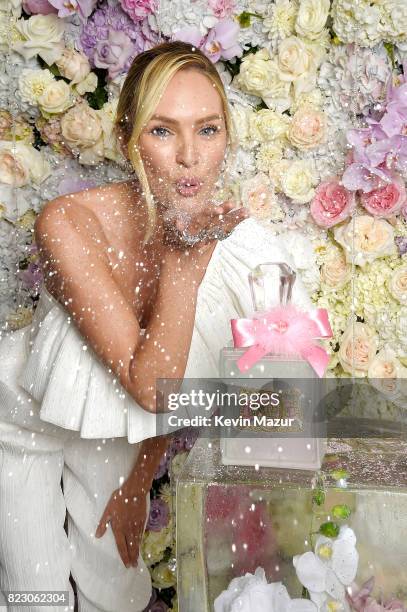 Candice Swanepoel launches Viva La Juicy Glace fragrance at The Edition Hotel in July 2017 in New York City.