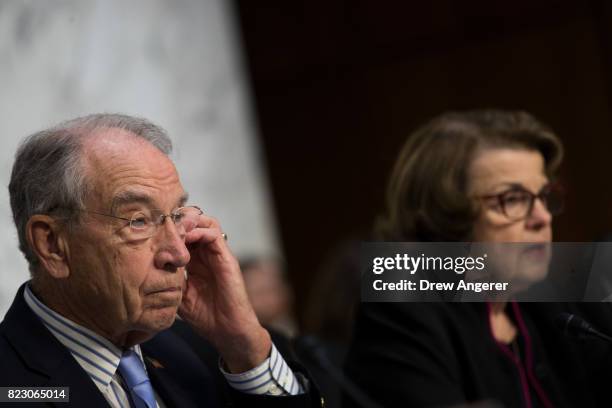 Committee chairman Sen. Chuck Grassley and ranking member Sen. Dianne Feinstein listen to testimony during a Senate Judiciary Committee hearing...