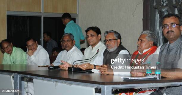 Leaders holding a meeting after Bihar Chief Minister Nitish Kumar submitted his resignation at Raj Bhawan on July 26, 2017 in Patna, India. Nitish...